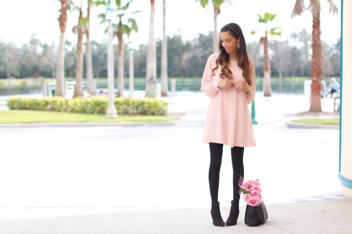 Blush tunic, black tights and booties