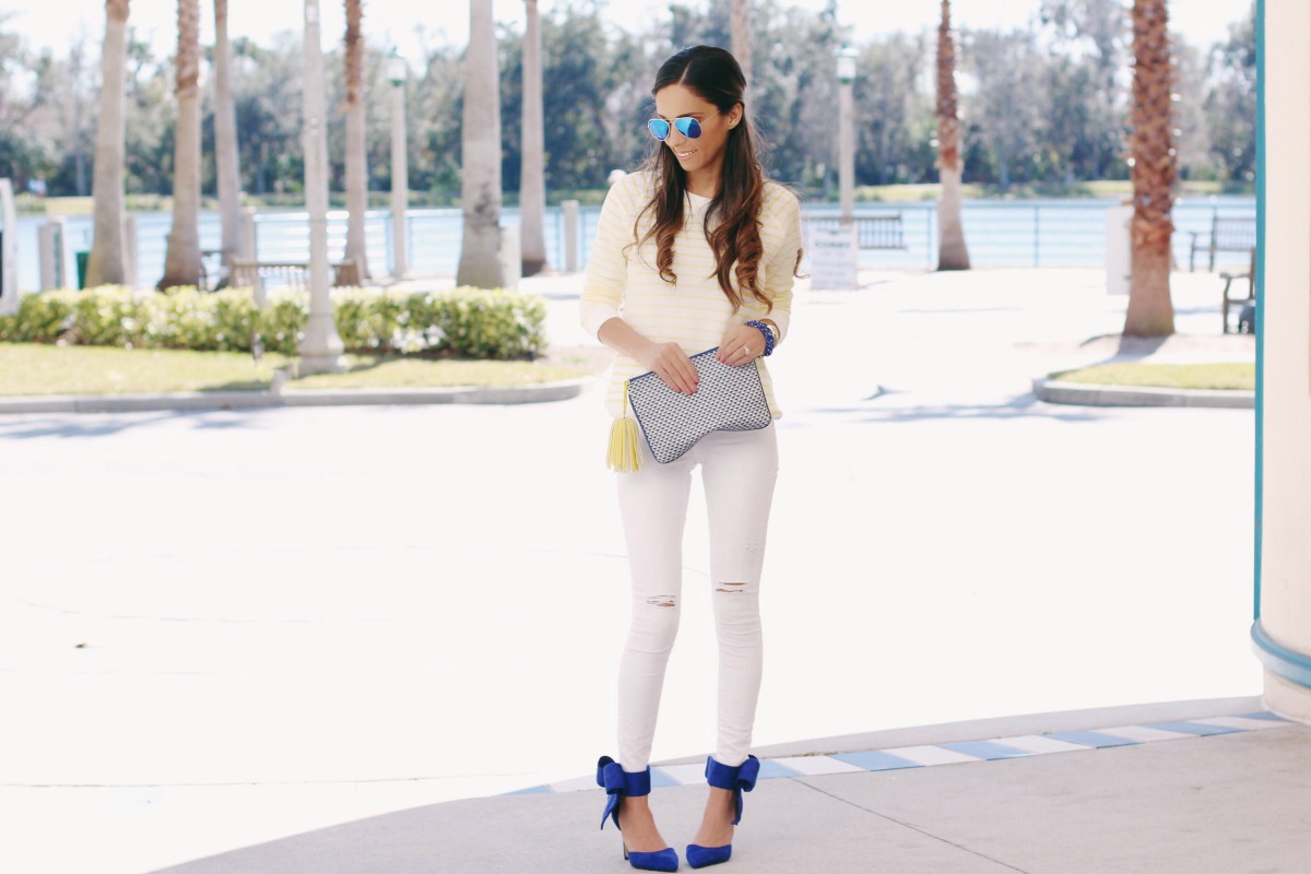 Yellow and White Stripe Sweatshirt with white ripped jeans and blue bow heels