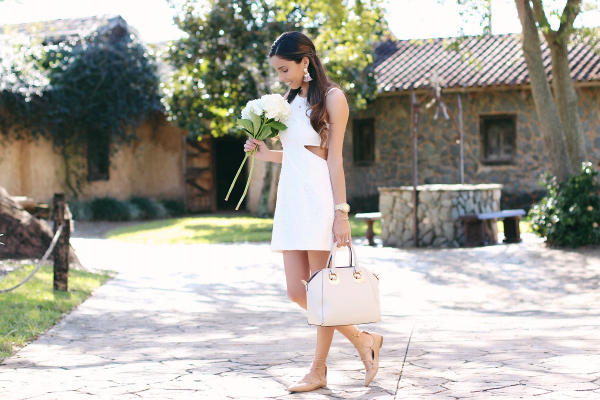 Little white lace cut out dress with nude lace up flats, neutral bag and gold accents
