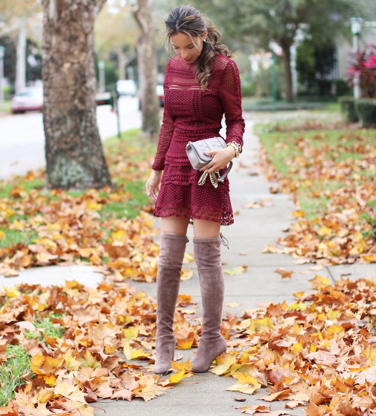Burgundy lace dress and thigh high boots